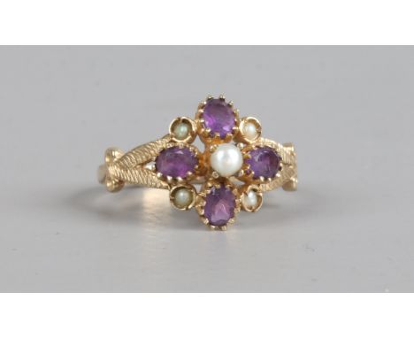 A 9ct gold ring, floriform set with amethyst and pearls, size K.