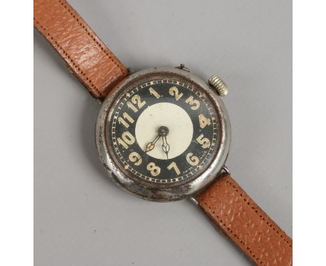A manual wind chrome plated wristwatch with fixed wire lugs Swiss made military style face.