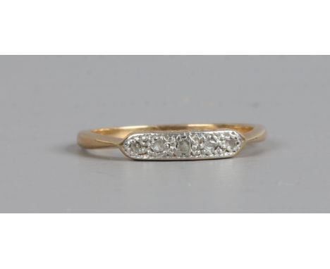 An 18ct gold and platinum five stone diamond ring, size M1/2.