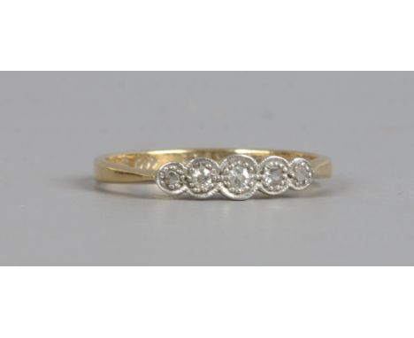 An 18ct gold and platinum five stone diamond ring, size N.