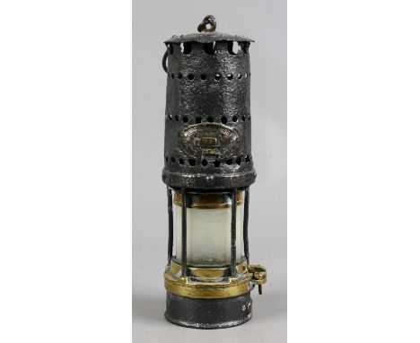 A W. E. Teale & Co. miners lamp.