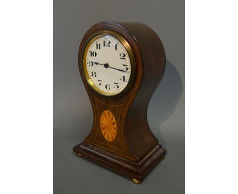 An Edwardian Mahogany Shell Inlaid Balloon Shaped Mantle Clock, the enamel dial with Arabic numerals and low brass bun feet, 