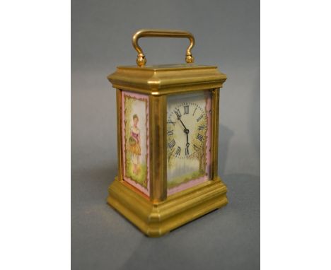 A French Brass Cased Miniature Carriage Clock with Porcelain Panels, the dial with Roman numerals and with lever escapement a