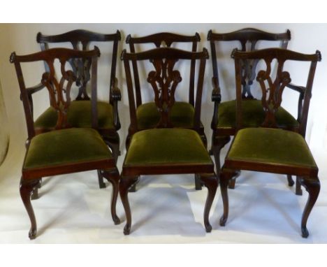 A Set of Six (Four plus Two) Mahogany Chippendale Style Dining Chairs, each with a scroll carved and pierced splat back above