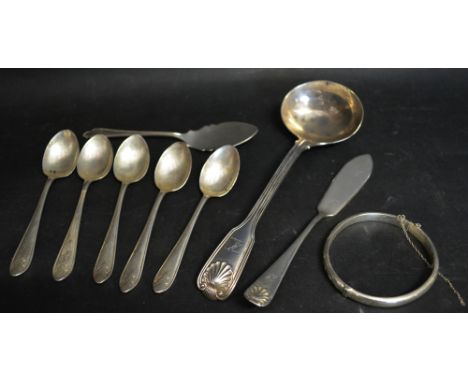 A Victorian London Silver Ladle together with a set of five silver teaspoons, another silver spoon, a silver butter knife and
