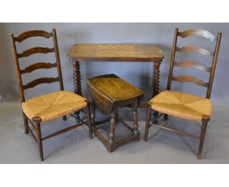 A Victorian Walnut Games Centre Table with Chess Board Top, together with a small oak drop flap table and a pair of ladder ba