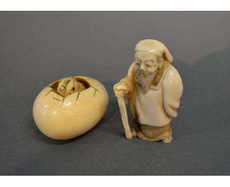 A Late 19th Early 20th Century Japanese Ivory Netsuke in the form of a chick breaking out of an egg, seal mark to base togeth