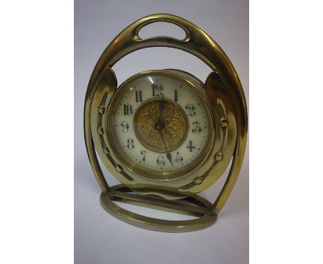 A Brass Horseshoe Framed Mantel Clock, circa late 19th century, engraved to top of frame, 16cm high, also with an Edwardian e