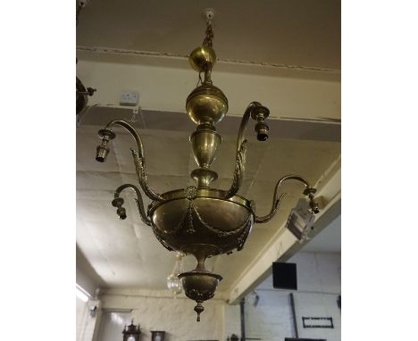 A Neo Classical Style Brass Ceiling Light, Having five branches, Decorated with swags and acanthus leaves, approximately 104c