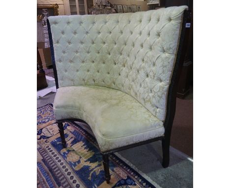 A Mahogany Framed Conversation Sofa, 20th century, Upholstered in buttonback cream fabric, Having a shaped front, 