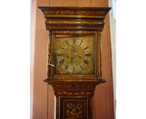 A Dutch Walnut Marquetry Longcase Clock, circa 18th century, Having a gilt metal and silvered dial with date aperture, decora