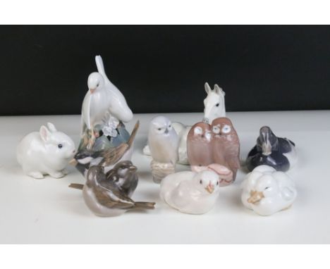 Quantity of Royal Copenhagen and other animal figurines to include doves 402, white rabbit 4705, owl 1741, horse, duck 1924, 