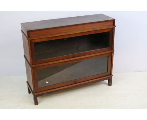 20th century display cabinet bookcase with two liftable glazed doors raised on square feet, H 77.5cm, W 91cm, D 27cm