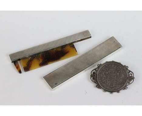 A fully hallmarked sterling silver cased comb together with a King George IV half crown silver brooch 