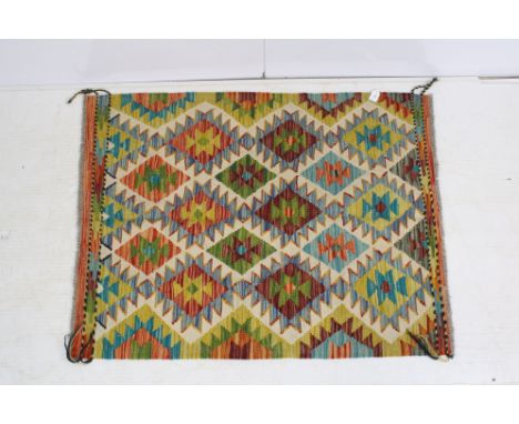 Chobi Kilim carpet rug having woven coloured geometric patterning, measure 110cm x 85cm