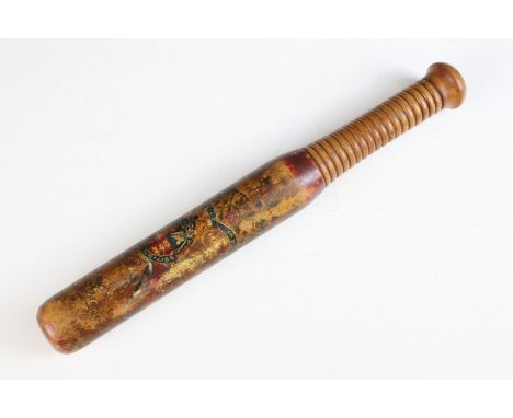 Policeman's truncheon in turned wood with crested insignia, Length 31.5cm