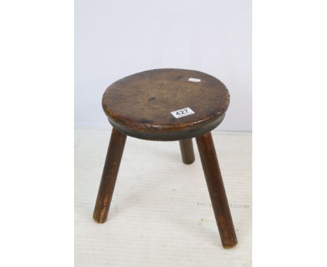 19th century sycamore and pine three-legged milking stool, 29cm high