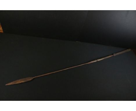 Late 19th century / early 20th century tribal hunting or throwing spear with double ended metal tips, each double edge steel 