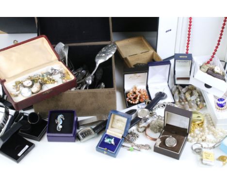 A large collection of mixed vintage and contemporary costume jewellery to include silver examples together with a selection o