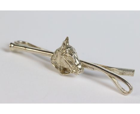 Silver equestrian tie pin in the form of a horse head and whip, Birmingham hallmark, maker RJS