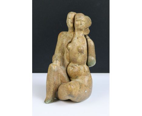 An ornamental ceramic interlocking man and woman figurine by Peter Wright.