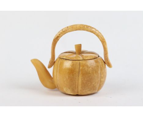 Chinese bone teapot with lid and swinging handle 