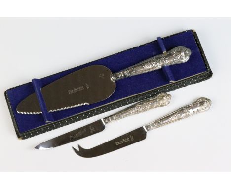 Set of three silver handled items including boxed pie server, cheese knife and a grapefruit knife, all Queens pattern dating 