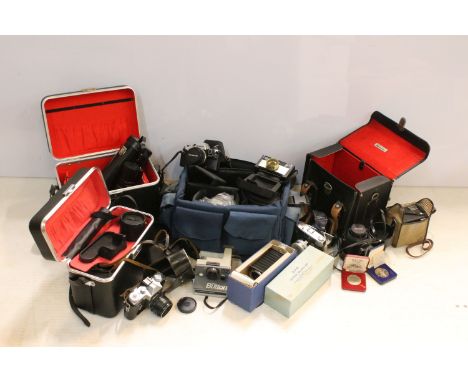 Quantity of cameras and accessories to include Kodak 255x Instamatic, OlympusOM10, Halinar Anastigmat, The Button polaroid, K