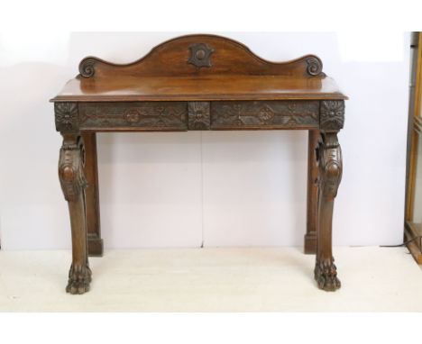 Carved oak hall console side table with two drawers, scrolled detail and carved lion paw feet, H 108cm, W 122cm, D 44.5cm