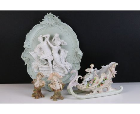 Continental hand painted swan sleigh porcelain centrepiece figurine depicting a lady riding a swan, together with two figural