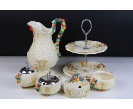 Clarice Cliff 'Celtic Harvest' collection to include double tired cake stand, three preserve pots (two with lids) lidded suga