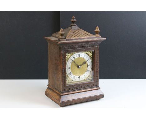 Edwardian oak cased carved mantel clock with gilt detail to face, marked W&amp;H to back of movement, H 41cm, W 20.5cm, D 14.