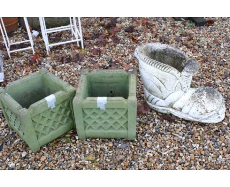 Reconstituted stone garden boot planter, 35cm high together with a pair of reconstituted stone planters of square form with l