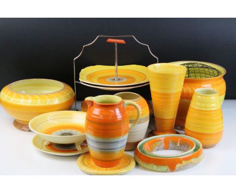 Collection of Shelley Harmony ware in varying sunset tones of orange and yellow, to include jardiniere, vases, centre bowl, f