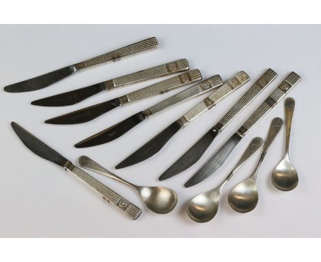 A small group of mixed cutlery, some being marked with airline logos to include British Airways and BOAC.