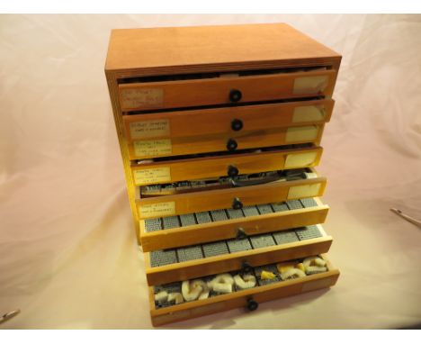 A letterpress type cabinet with 8x drawers of type and 4x further trays of type and furniture. Please note that buyer must ar