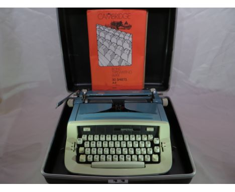 An imperial typewriter in carry case. Please note that buyer must arrange collection of this item.