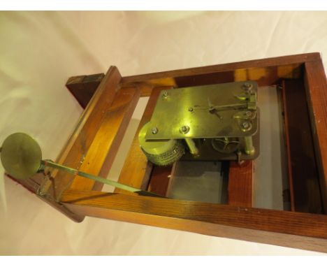 A Fusee clock movement. Please note that buyer must arrange collection of this item.