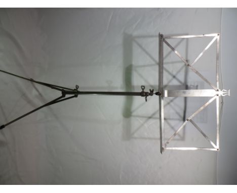 A vintage folding music stand.