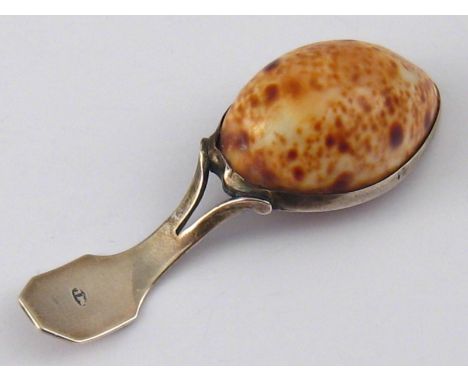 A silver mounted cowrie shell caddy spoon by Matthew Linwood, maker's mark only. Birmingham, c.1810. 