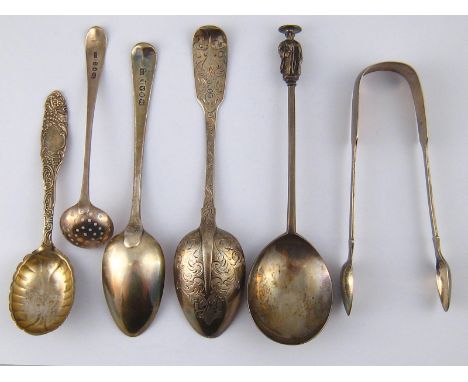 A quantity of sterling silver, including a Georgian sifter ladle and dessert spoon, an Irish dessertspoon, a pair Exeter tong