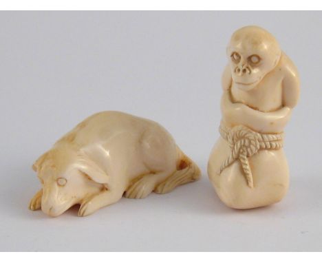 Two netsuke, circa 1920,one a monkey in a sack, its hands tied behind its back, the other a dog lying down, both signed. 