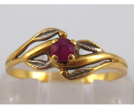 A French hallmarked 18 carat gold ruby ring, size L, 1.1 gms.
