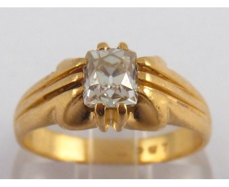 A yellow metal (tests 18 carat gold) diamond solitaire ring, the diamond measuring approx. 5.8 x 5 x 4.1mm deep, estimated to