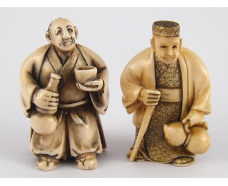 Two ivory netsuke, circa 1920,one, signed, of a man with bottle and cup, the other a man carrying a gourd. 