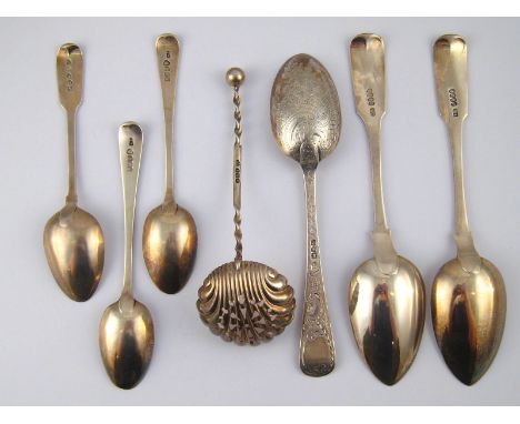 A pair of Georgian Irish silver fiddle pattern dessert spoons, IB, probably John Buckton, Dublin, 1823, a decorated O.E. patt