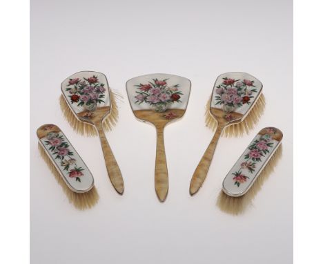 each piece decorated with enamel and floral designs, contained in a fitted case (unassociated) , by Henry Clifford Davis, Bir