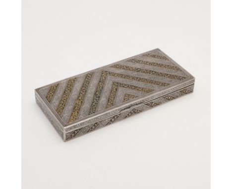 rectangular, with a velveteen lining, the cover &amp; sides decorated with alternating enamel chevrons &amp; foliage within, 