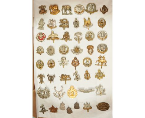 A Group of 45+ Military Cap Badges &amp; Similar. Mostly British Army regiments. Conditions generally appear Good Plus to Exc