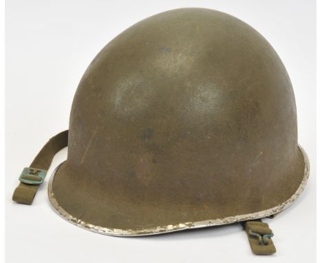 American WW2 Fixed Bale M1 Steel Combat Helmet. This is an early example (1941 - 42) with front seam split and the chinstrap 